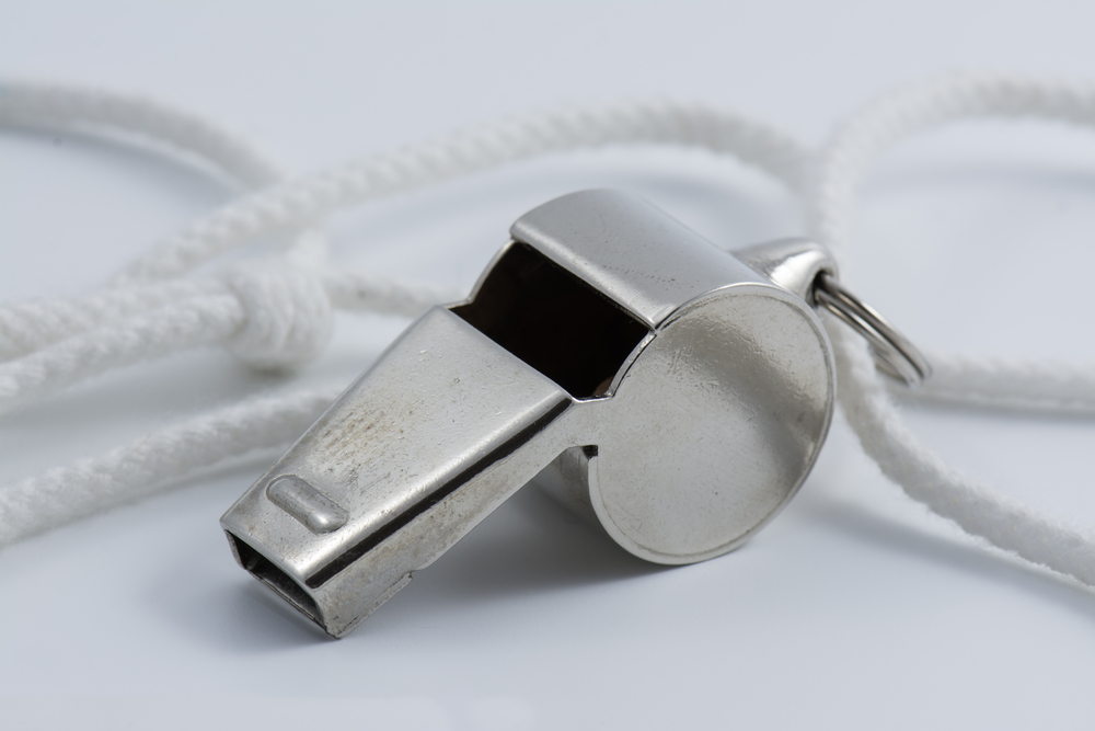 Silver school PE sports whistle on white background Will the Whistle be Silenced? Dismantling Dodd-Frank